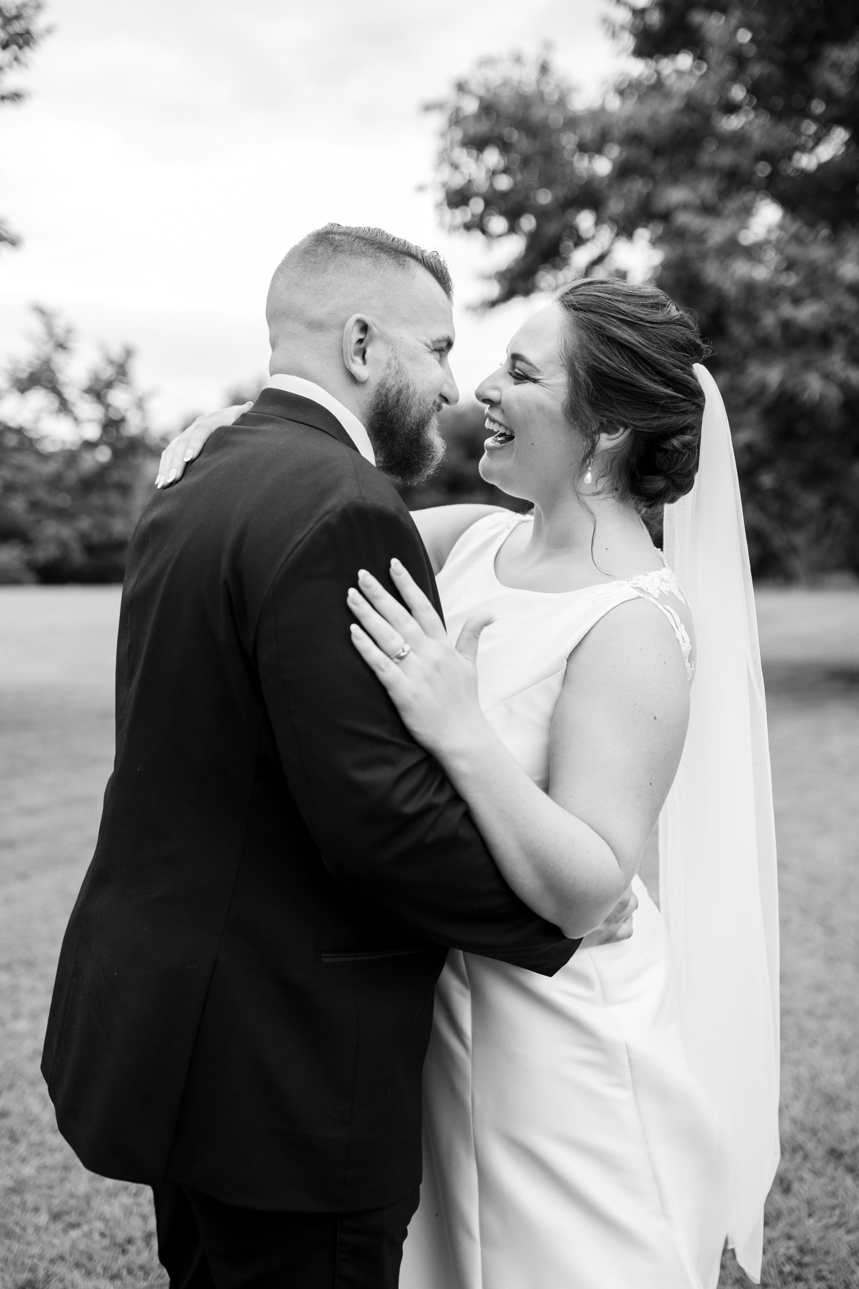 Couple embracing during wedding portrait session - Luxury Wedding Photographer - Wedding Photographer DMV