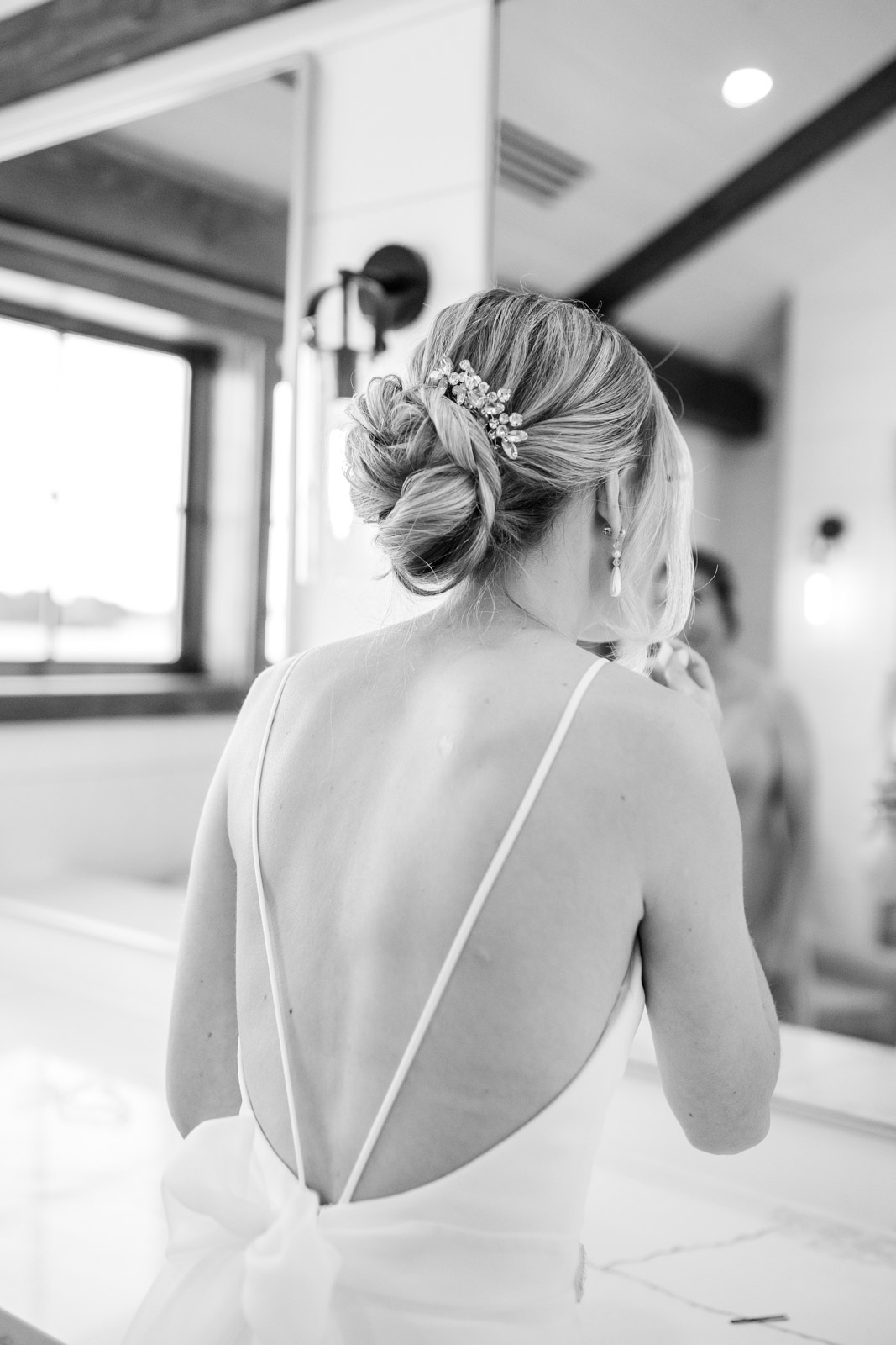 Bride getting ready for a Kent Island Resort Wedding in the Getting Ready Suite