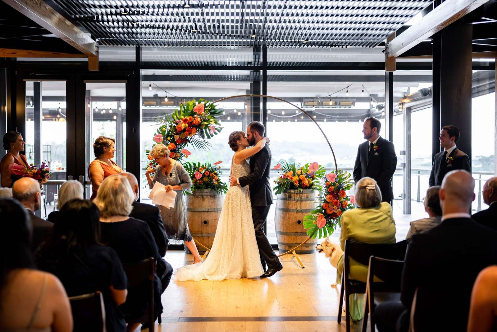 First kiss during wedding ceremony at District Winery