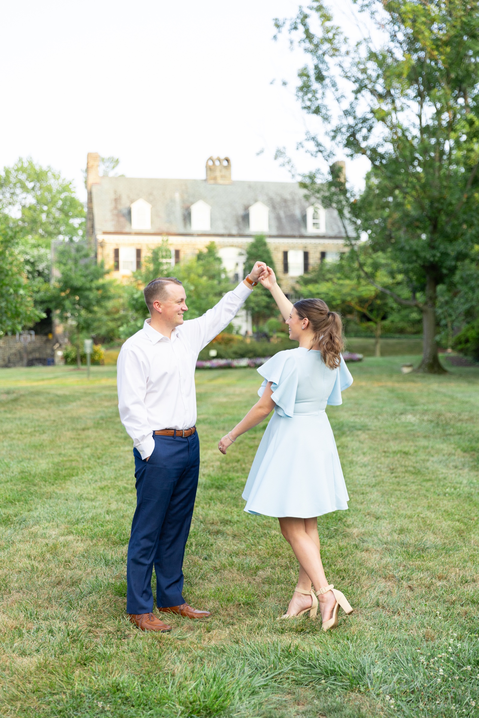 Maryland engagement session at Sherwood Gardens, in front of the home