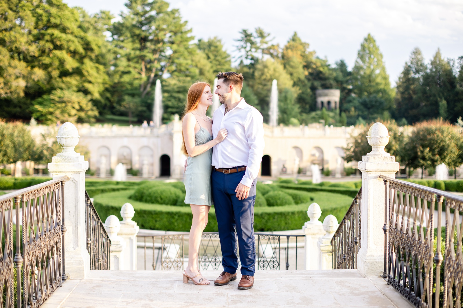 Sunset engagement session at Longwood Gardens, overlooking the manicured lawns and venue.