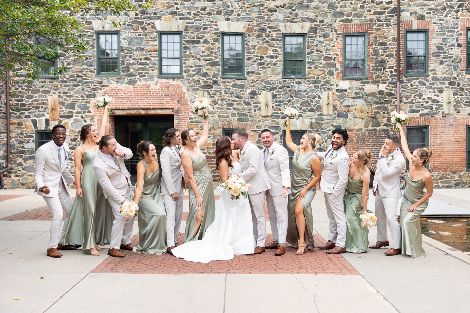 Bridal party portraits at Mt. Washington Mill Dye House, with the groomsmen in tan and the bridesmaids in sage green