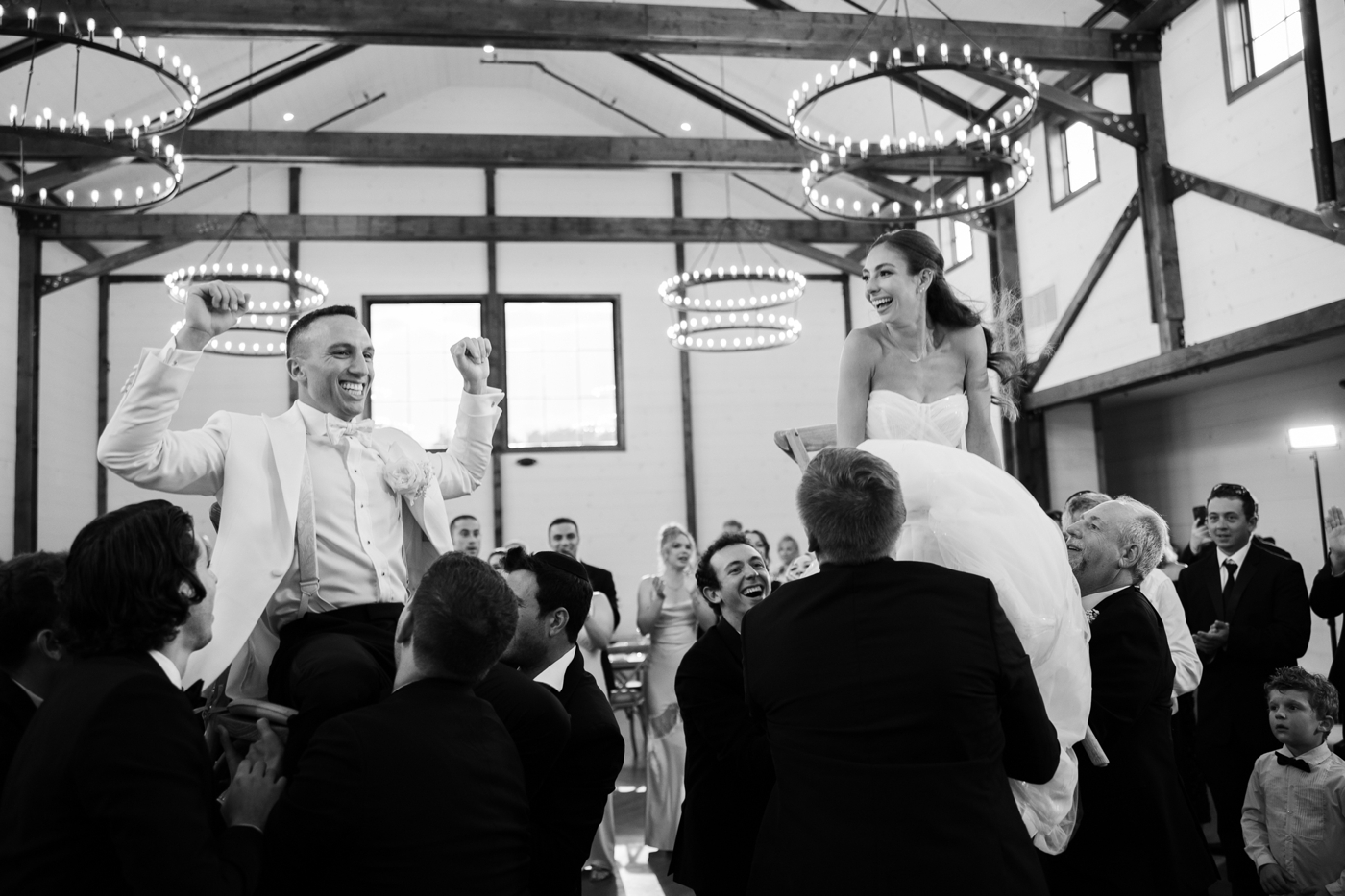 Guests dancing during the lively Hora at Gracie and Ari’s black-tie wedding reception