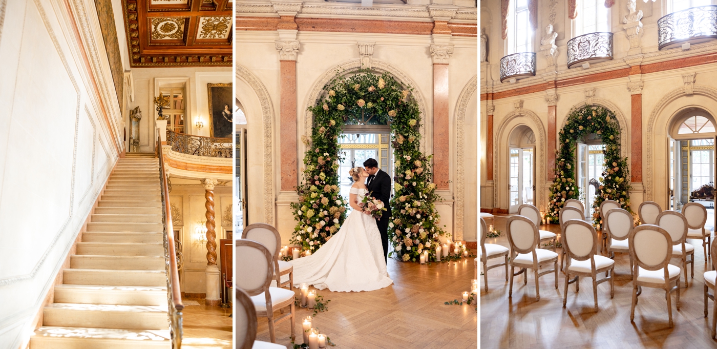 Indoor candlelit wedding ceremony at Larz Anderson House in Washington, DC, with a lush floral arch