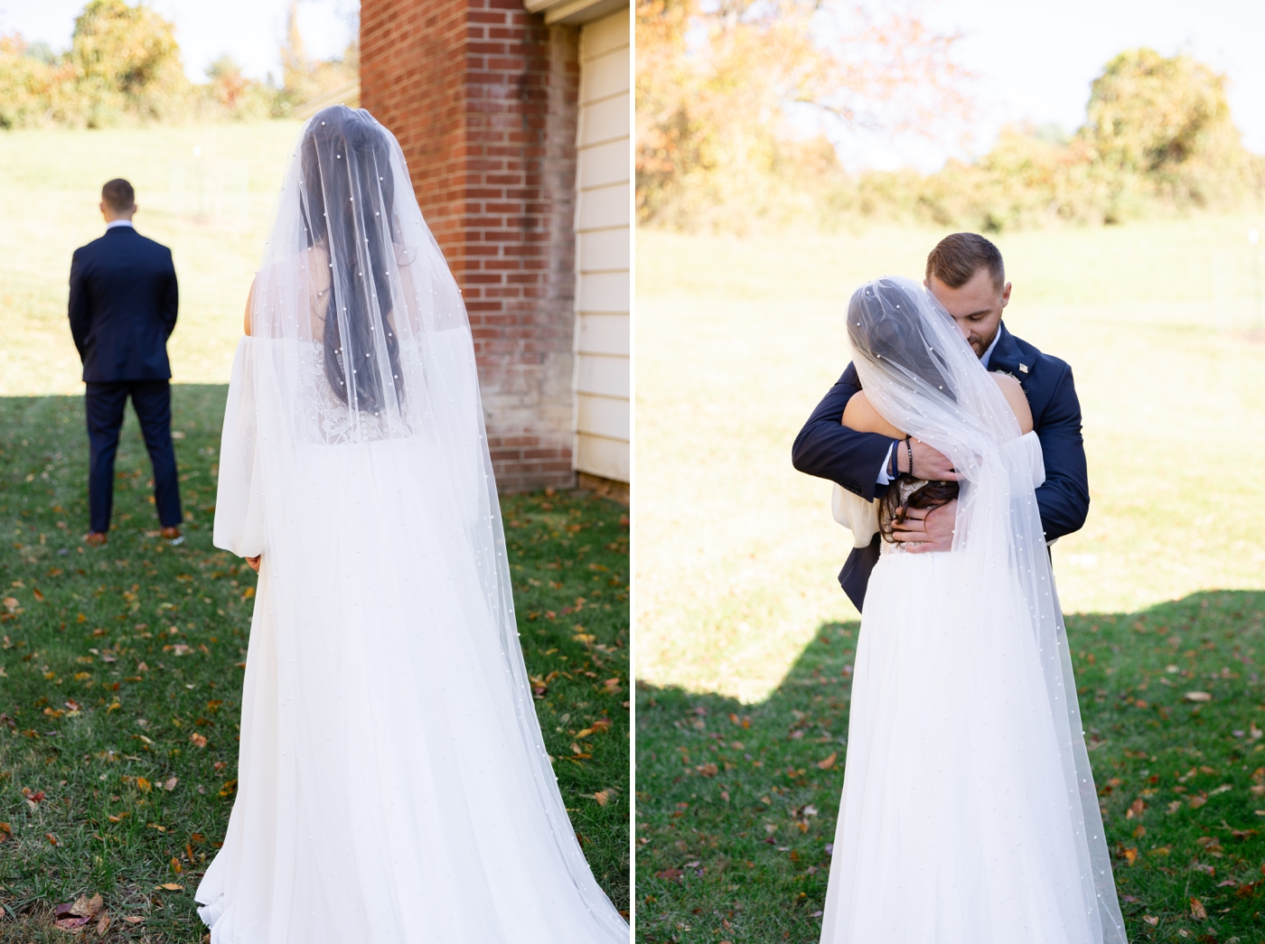 Bride and groom first look on the lawn outside of Stone Ridge Hollow, with the bride wearing a long veil and chiffon gown