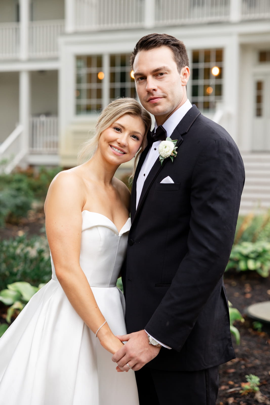 Bride and groom wedding portrait outside the Manor House
